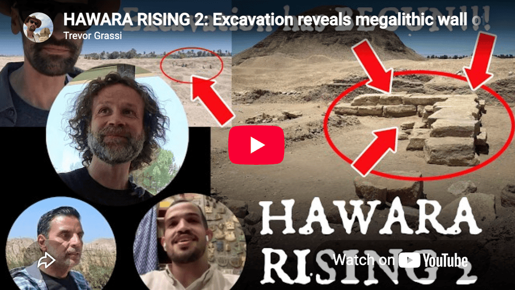 Excavation at Hawara reveals ancient megalithic wall structure with archaeologists present.